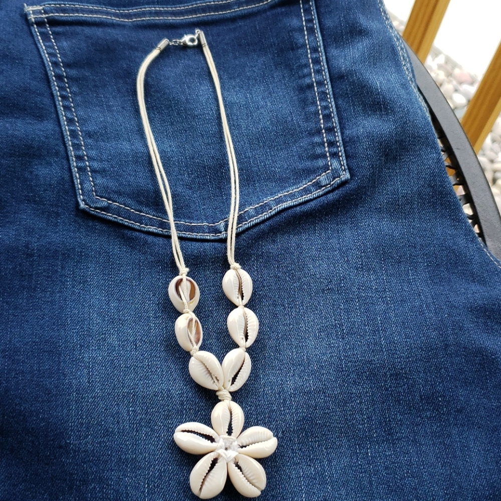 Handmade seashell necklace on a cord